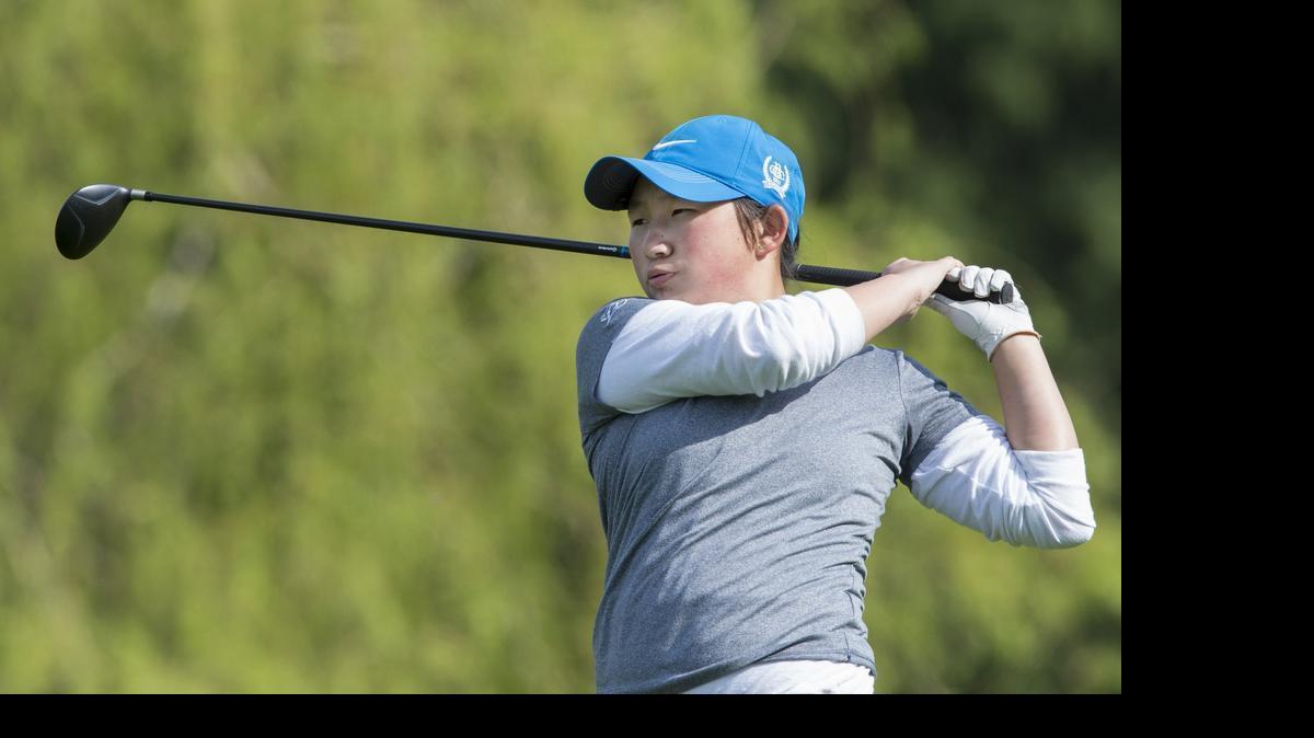 
Squalicum's Maddi Knudson watches her ball land on the fairway of hole one at the Whatcom County Championships on Thursday, April 2, at Sudden Valley Golf Course in Sudden Valley, Washington. 
