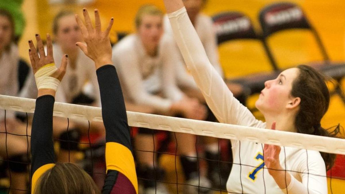 
Ferndale’s Rose Compton tips the ball over the net in the first round of the Class 3A state volleyball tournament on Friday, Nov. 14, at Saint Martin's University in Lacey.
