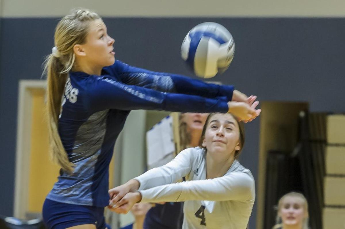 Lynden Christian’s Gracelyn Weg, left, and Kelsie Otter fo for the ball against Squalicum during a Sept. 27 match. The Lyncs open the Class 1A State Tournament Friday in Yakima against Freeman.