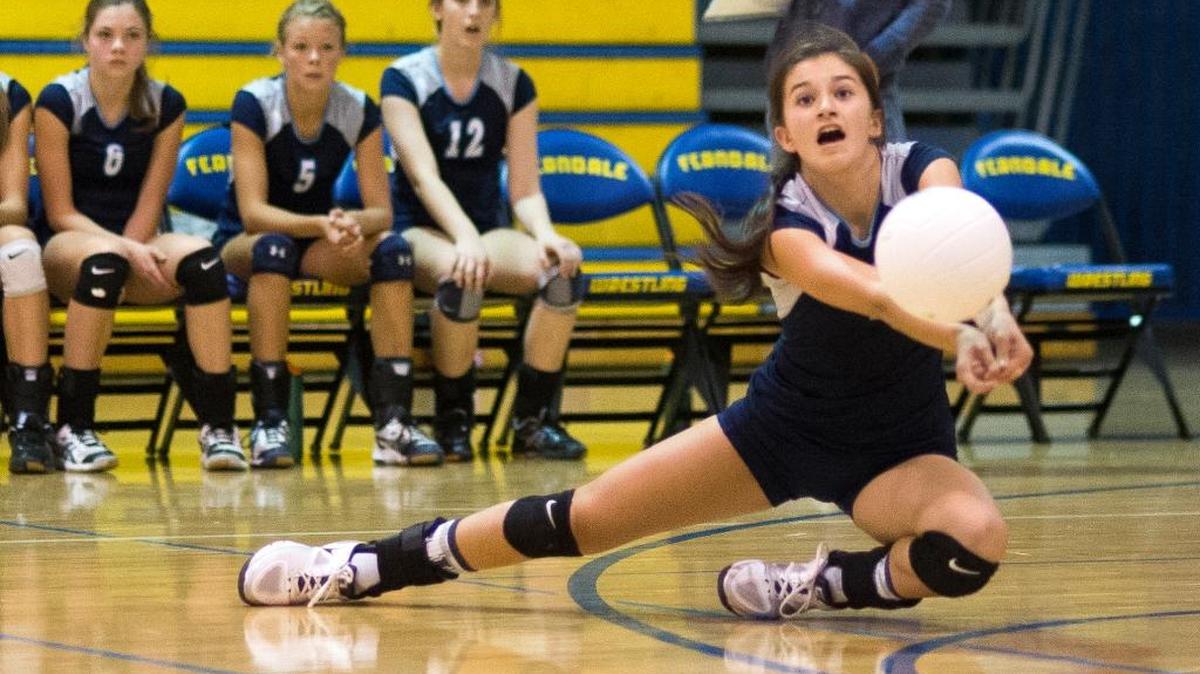 
Lynden Christian's Kelsie Otter lunges to keep the ball in play during a victory over Ferndale on Tuesday, Sept. 22, at Ferndale High School in Ferndale.
