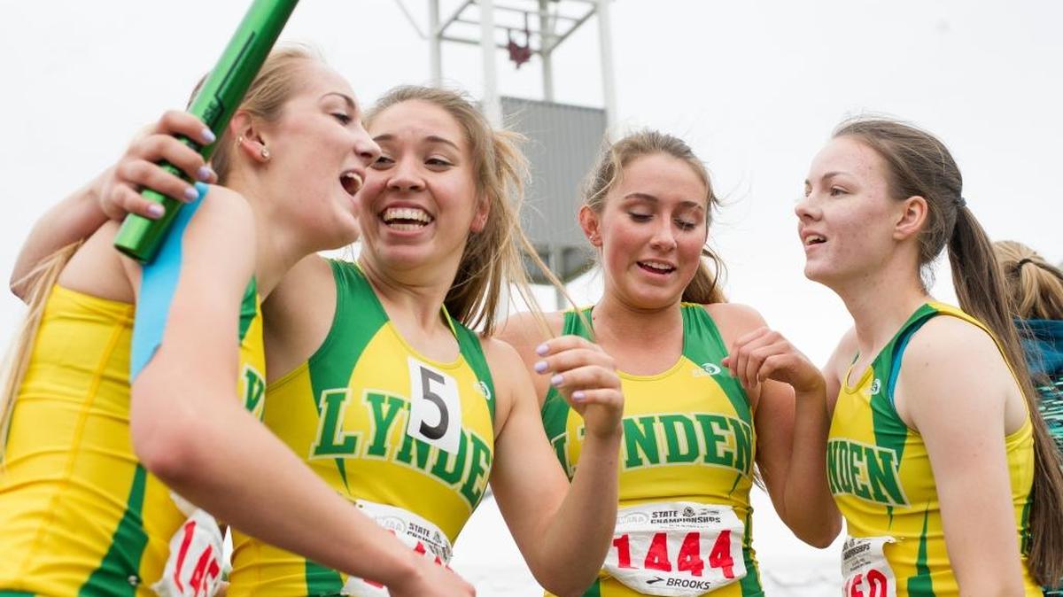 Lynden's girls 4x400 relay team, from left to right, Lauren Zwiers, Jasmyne Neria, Cassidee Barclay and Sierra Smith celebrate winning the 2A state championship on Saturday, May 28, at Mount Tahoma High School in Tacoma.