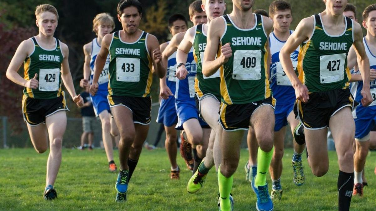 Sehome’s Riley Allsop (409) leads a pack of Mariners runners during the NWC Championships on Thursday, Oct. 22, at Civic Stadium.
