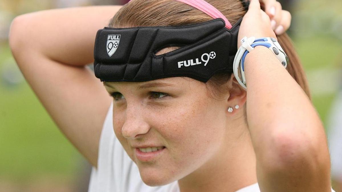 Lia Whitmore, from Orlando, Fla., has sustained several concussions in her career playing soccer, so she now wears a head brace for protection.
