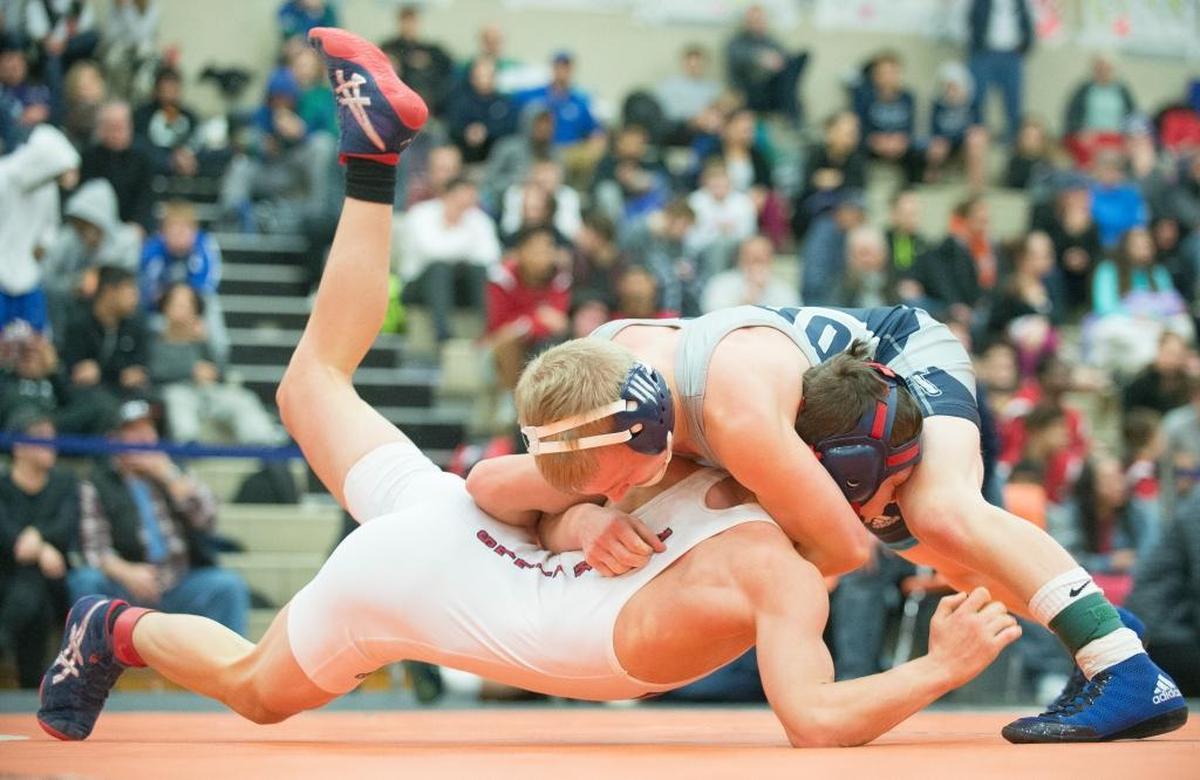 Squalicum's Jaiden Bundy, right, controls Black Hills' Colton Burke on his way to winning the 113-pound championship match at the Battle at the Border wrestling tournament on Saturday, Dec. 9, in Blaine.