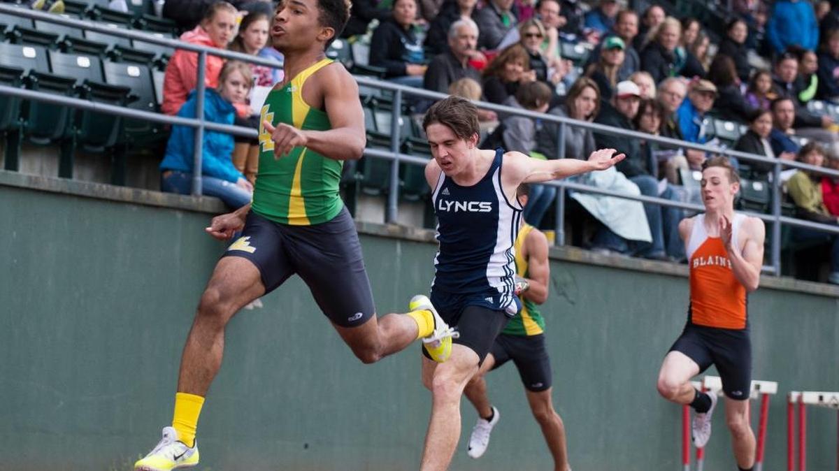 Lynden’s Christian Payne crosses the finish line first in the 100 meters at the Northwest Conference Track and Field Championships on Friday, April 22, at Civic Field.