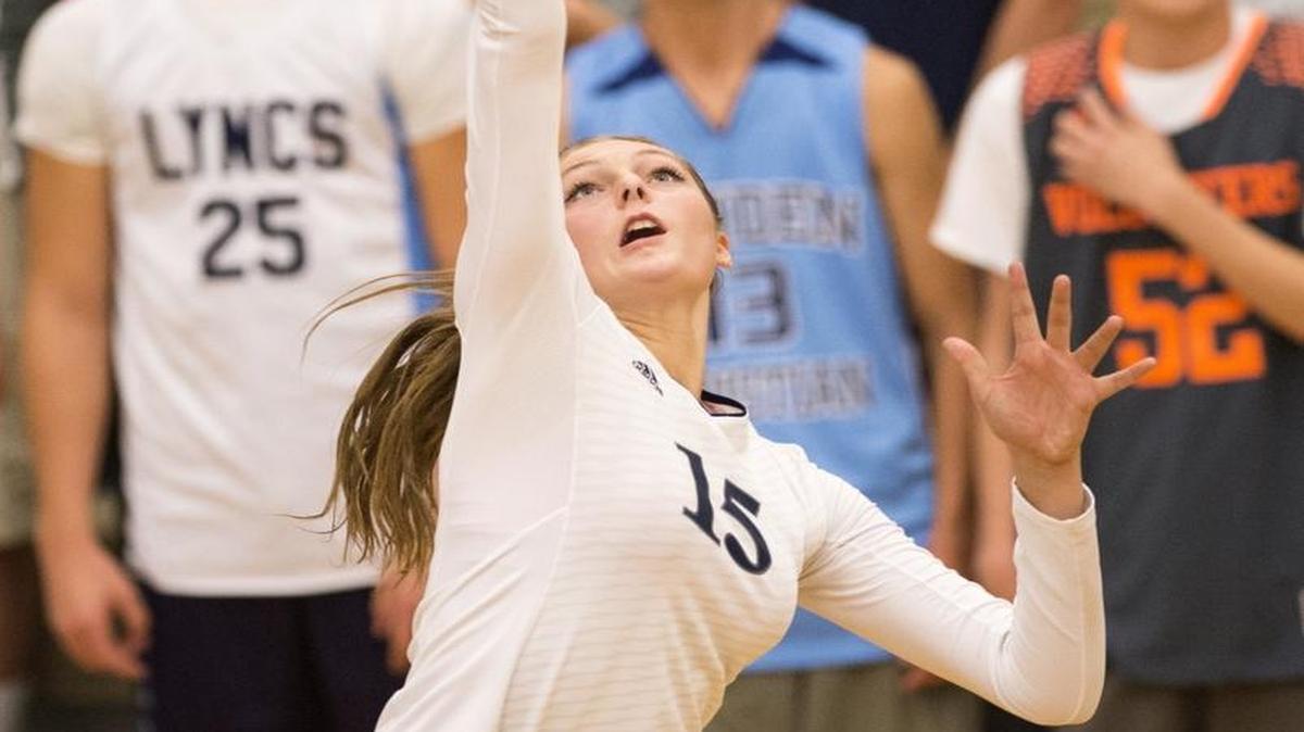 
Lynden Christian's Kara Bajema spikes the ball against King's during the 1A Northwest District Volleyball Tournament at Lynden Christian High School on Oct. 29.
