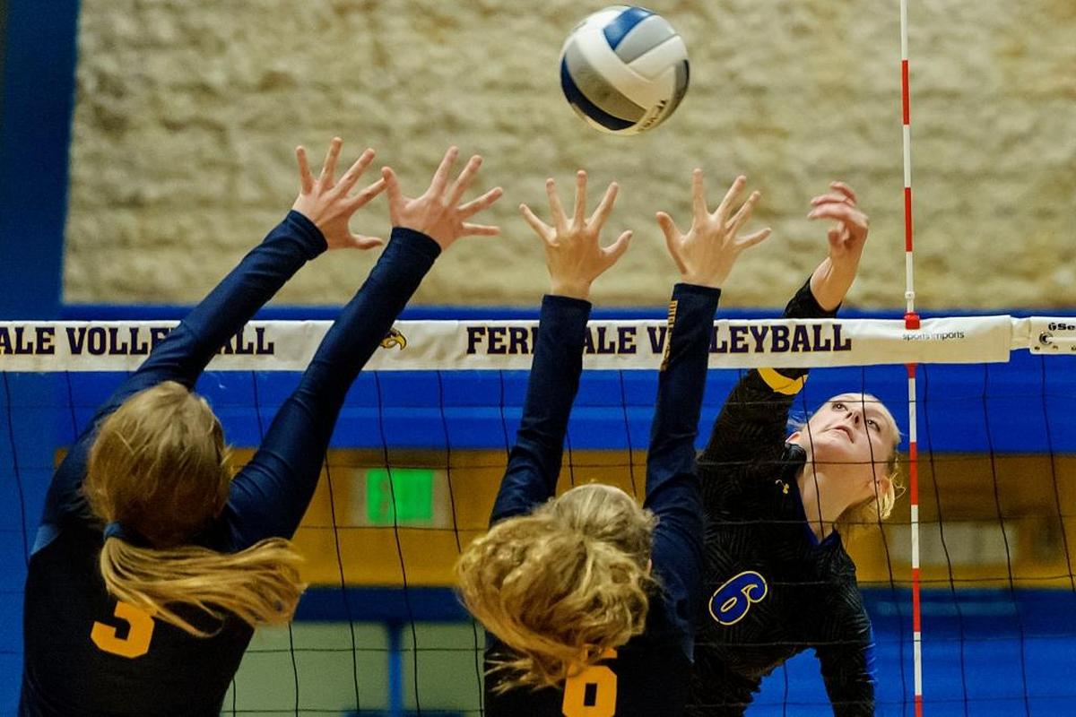 Burlington-Edison’s Afton Field, left, and Tessa Martinson attempt to stop a spike from Ferndale’s Kylie Honrun during an Oct. 18 match. Ferndale will face Stadium in the first round of the Class 3A State Tournament Friday in Kennewick.