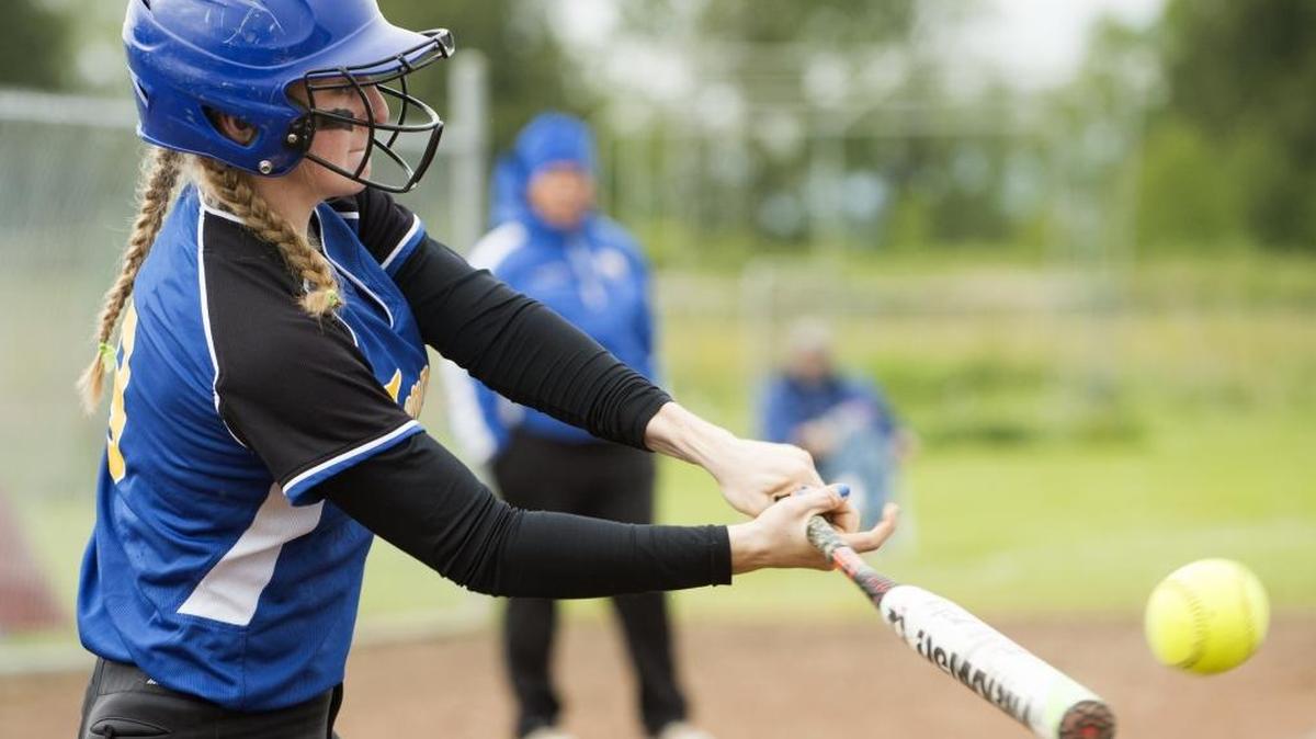Ferndale’s Drew Westford hits a two-run single against Nooksack Valley. Westford signed a national letter of intent to play softball for Fairfield University.