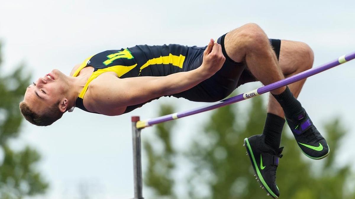 Lynden junior Aaron Weidenaar, 17, clears 6 feet, 4 inches to win the high jump during the 2A District Championships on Friday afternoon May 19, 2017, at Civic Field in Bellingham, Wash.