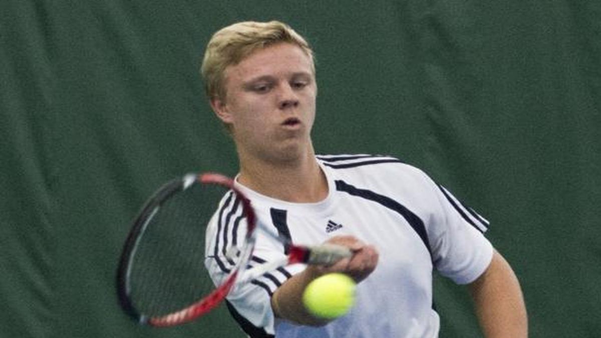 
Squalicum's Kevin Smiley hits the ball during a doubles match at the Class 2A Northwest District Boys' Tennis Tournament at the Bellingham Tennis Club on Wednesday, Oct. 22, 2014, in Bellingham.
