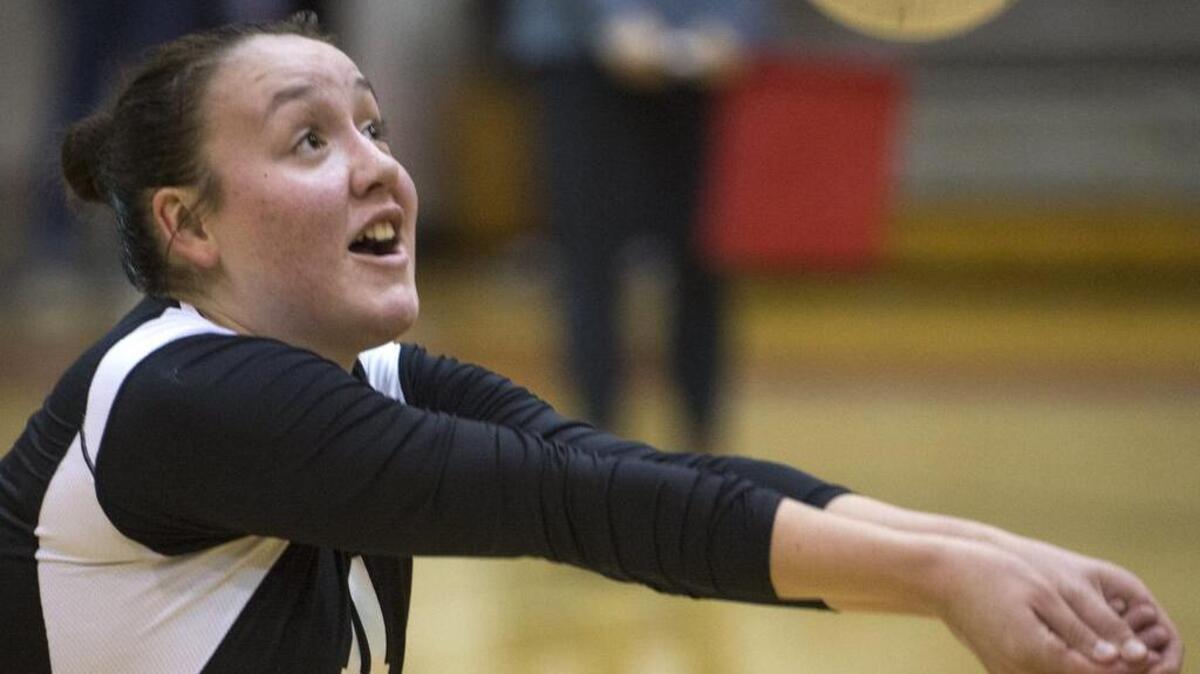 
Bellingham’s Summer Douglas bumps the ball in a game against Lynden Christian on Tuesday, Sept. 30, 2014, in Bellingham.
