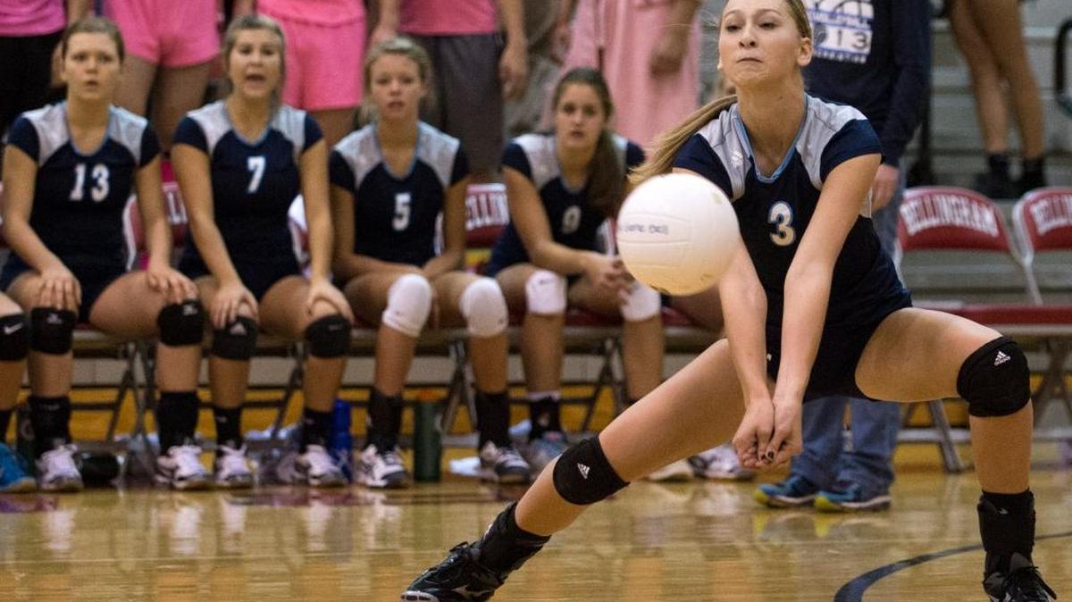 Lynden Christian's Carli Tjoelker bumps the ball in a game against Bellingham on Tuesday, Sept. 30, 2014 in Bellingham.