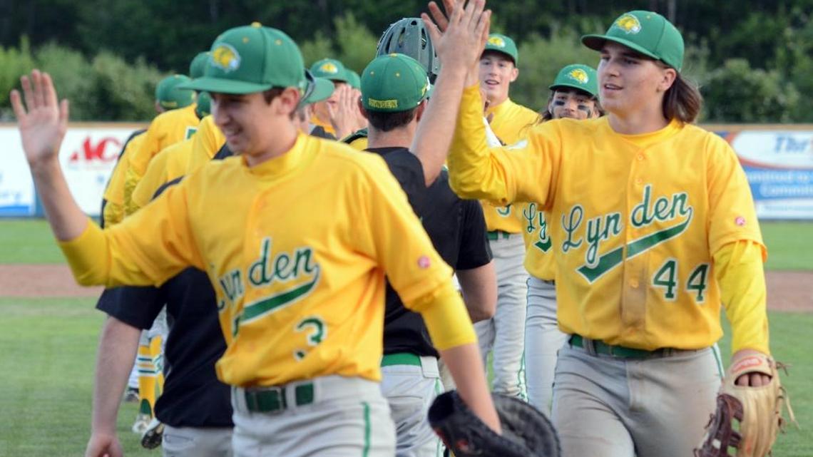 Which Whatcom County baseball team opened at the top of its classications rankings?