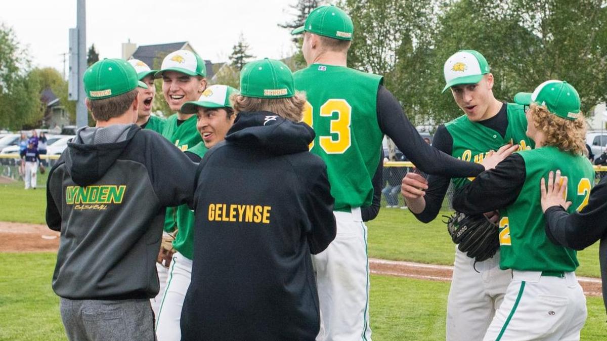 Lynden players celebrate another one-run victory, this a 2-1 win over Anacortes in the Class 2A bi-district semifinals on Tuesday, May 9, at Anacortes. The Lions have 10 shutouts and seven more victories with just one run allowed this season.