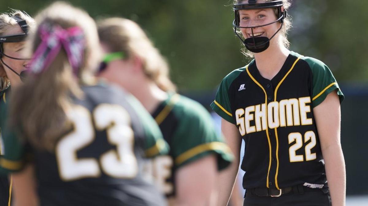 Sehome’s Savannah Smith joins her teammates on the pitching mound during a 11-3 victory over Anacortes on May 11. Smith has been selected along with Blaine’s outfielder Holly Siebol to represent the Northwest region at the United States Specialty Sport Association Elite Select U14 Futures All-American Games.