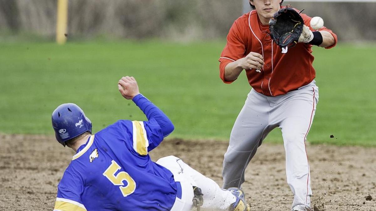 Bellingham shortstop Austin Shenton (24), right, fields a throw during a baseball game on March, 30, 2015. Shenton was selected by the Cleveland Indians in the 34th round of the MLB Draft on Saturday, June 11.