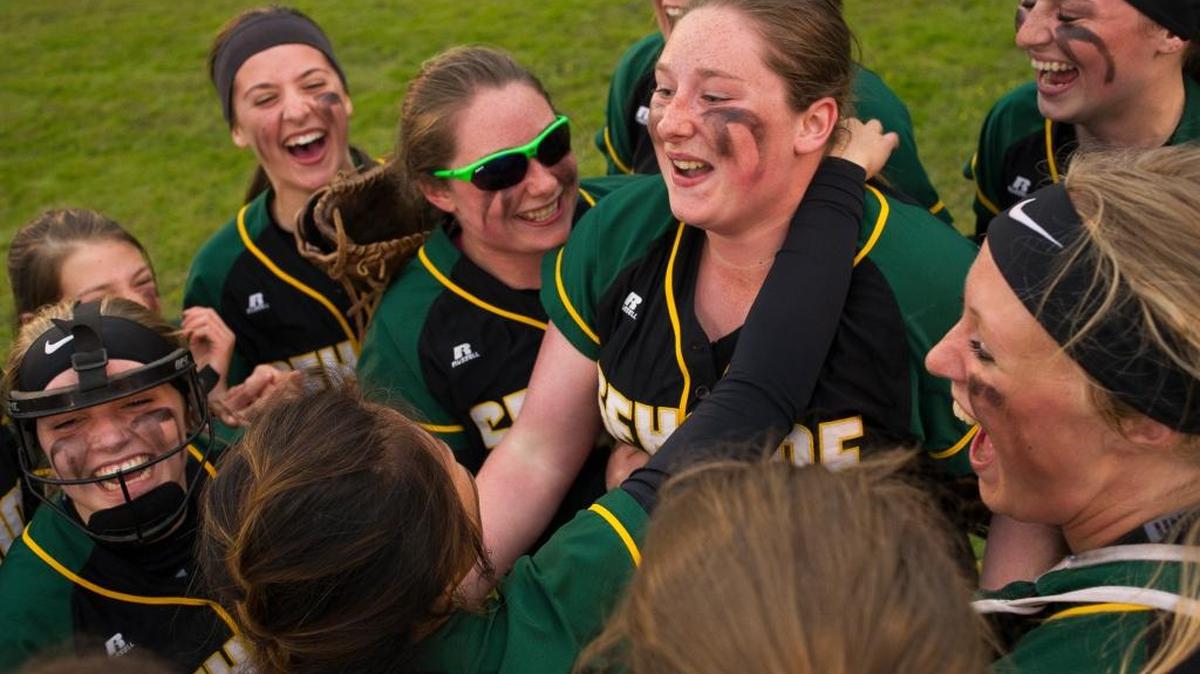 Sehome players celebrate in center field after defeating Lynden on Wednesday in the 2A bi-district softball tournament at Janicki Fields in Sedro-Woolley.