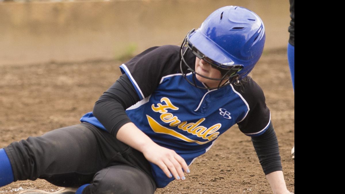 
Ferndale's Abigail Bauthues slides into home plate safe during a 5-2 victory over Mount Baker on Thursday, April 30, in Deming, Washington. 
