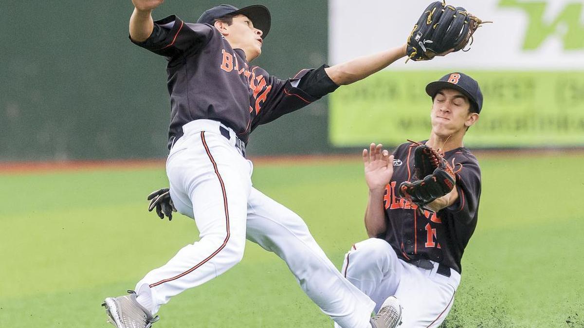 Blaine's Chase Abshere, left, and Jon Gunderson collide in the outfield as Abshere catches a fly ball during the second inning against the Fife Trojans in the 2A regional baseball tournament on Saturday, May 21, at Joe Martin Field in Bellingham. Fife defeated Blaine 3-0.