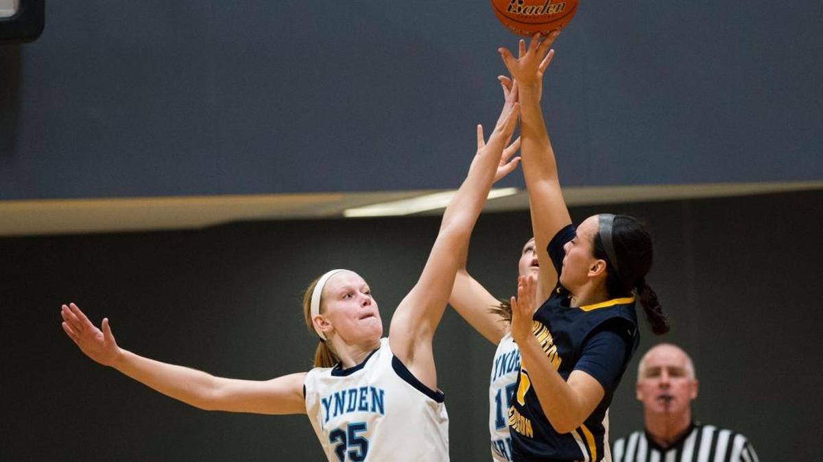 Lynden Christian’s Sam Van Loo, contests a Burlington-Edison shot during the Lyncs’ 71-58 victory on Tuesday, Jan. 12.