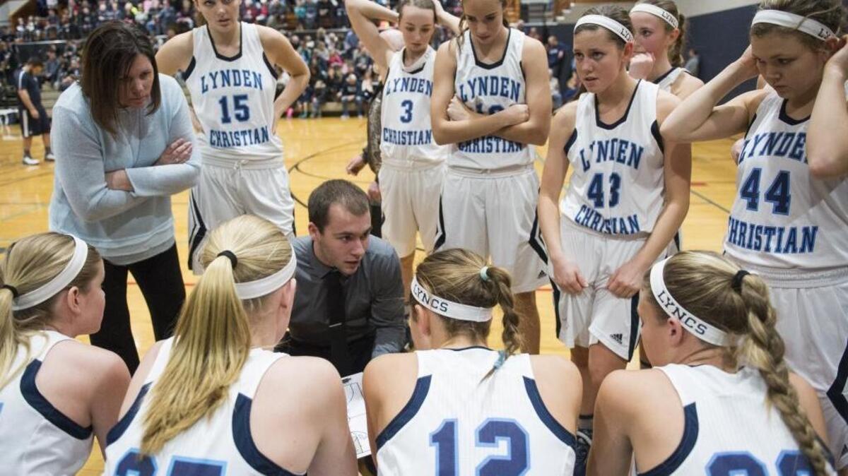 Coach Brady Bomber talks to his Lynden Christian girls’ basketball team during a 71-58 win over Burlington-Edison on Wednesday, Jan. 12, at Lynden Christian High School in Lynden, Wash.