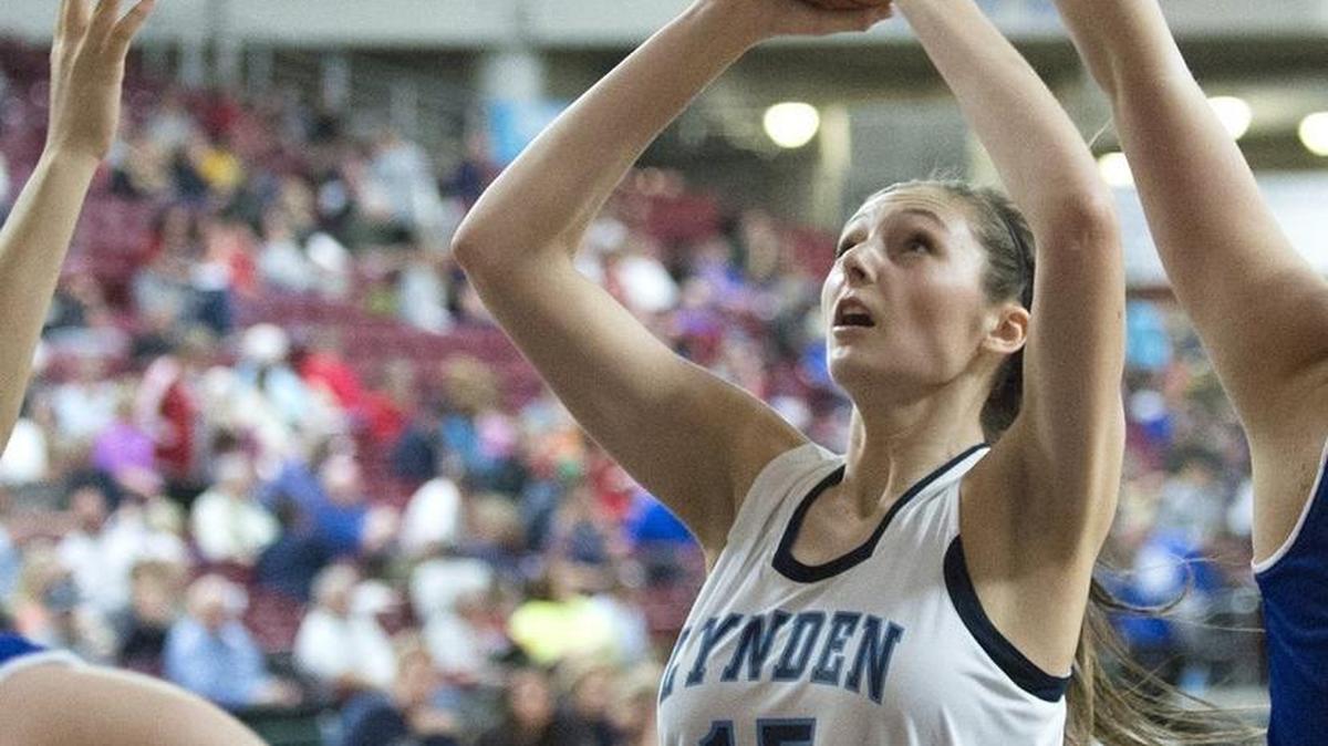 Lynden Christian’s Kara Bajema goes for a lay-up during a 36-19 win overCascade Christian in the 2015 Class 1A State Tournament in Yakima.