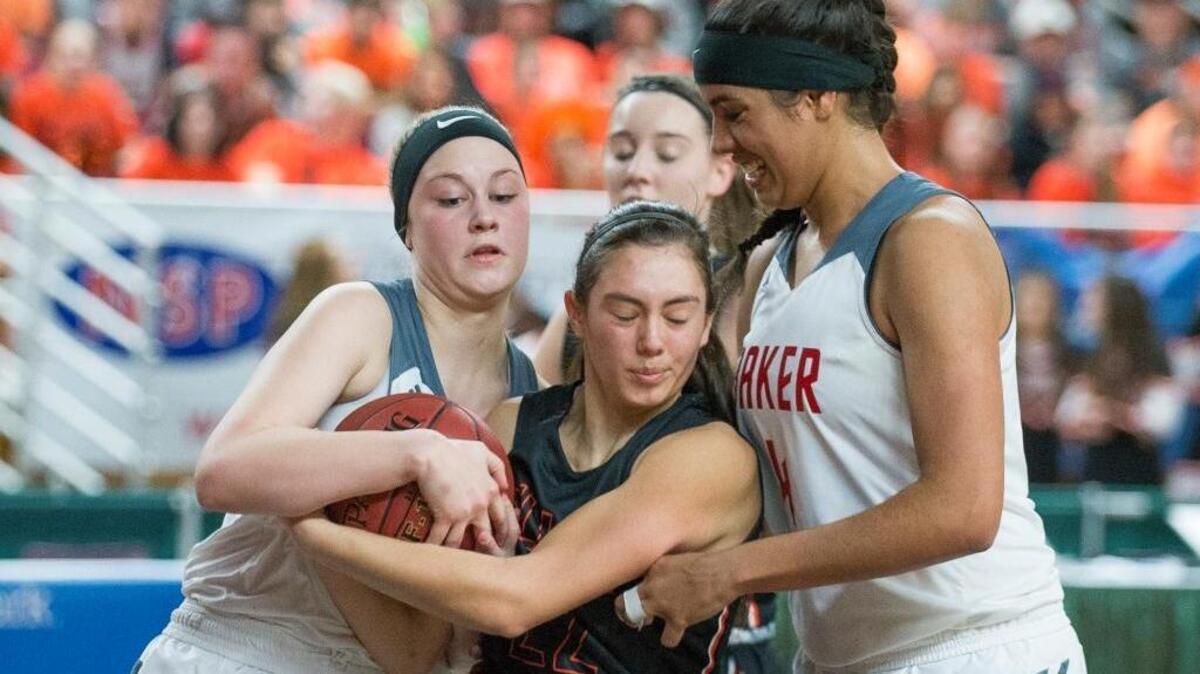 Mount Baker’s Jessica Soares, right, traps Zillah’s Kaia John, center, as teammate McKenzie Yost forces a jump ball on the opening day of the Class 1A Hardwood Classic on Wednesday, March 1, at the Yakima Valley SunDome in Yakima. Mount Baker defeated Zillah, 48-34.