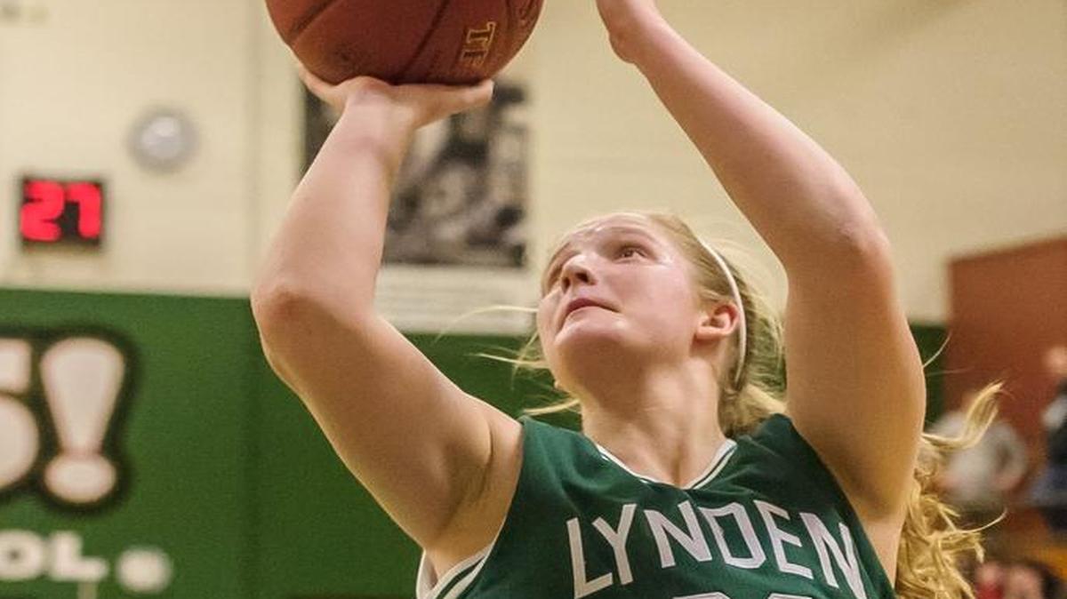 Lynden’s Elisa Kooiman (22) goes over Burlington-Edison’s Annaleis Reyes (24) during the third quarter in the Class 2A Bi-District Tournament semifinal Feb. 13 at Mount Vernon High School. Kooiman has been selected the All-Whatcom County Girls’ Basketball Player of the Year