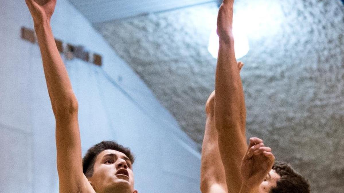 Lynden's Christian Zamora, left, shoots and scores over Ferndale's Jackson King during a boys' basketball game on Friday, Dec. 11, at Ferndale.