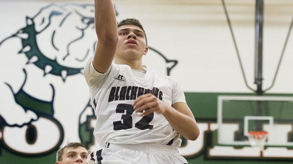 Lummi’s Trazil Lane (32) lays one up for two points against Mt. Rainer Lutheran during the opening round of the 2015 Class 1B State Tournament regional round at Mount Vernon High School.