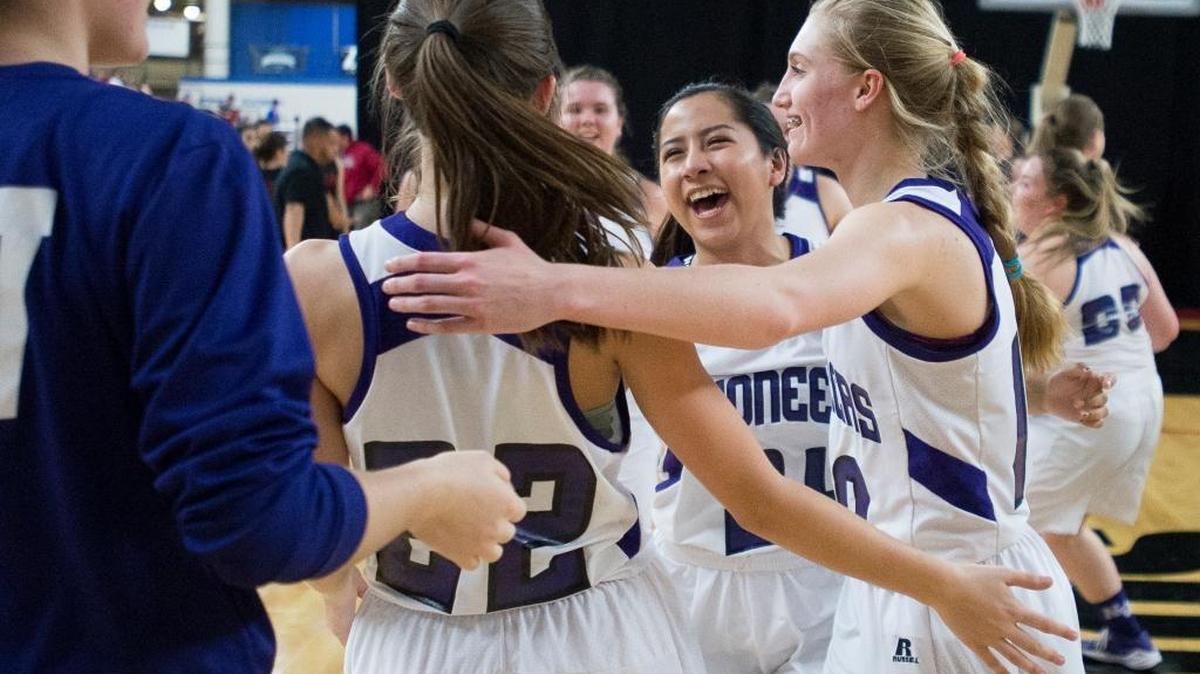 Nooksack Valley players celebrate defeating Zillah 51-42 in a 1A girls' state quarterfinal game on Thursday, March 3, at the Yakima Valley SunDome.