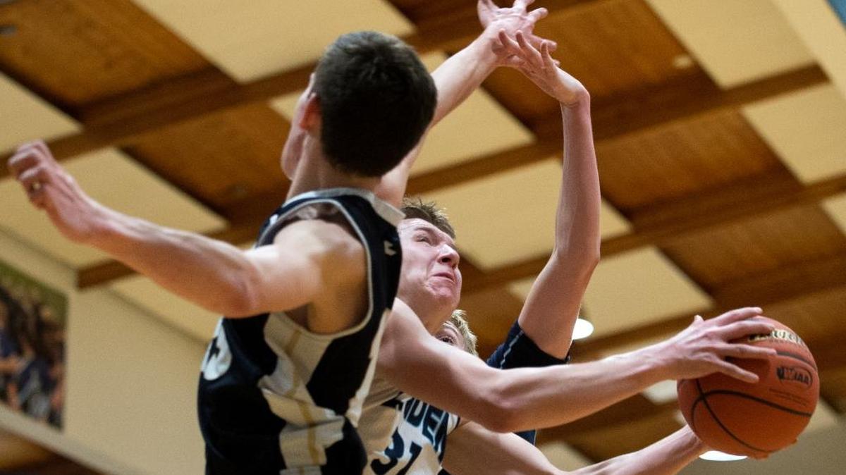 Lynden Christian's Zach Roetcisoender goes up for a basket Wednesday, Feb. 10, at Lynden Christian High School in Lynden. Lynden Christian defeated Cedar Park Christian 64-58.