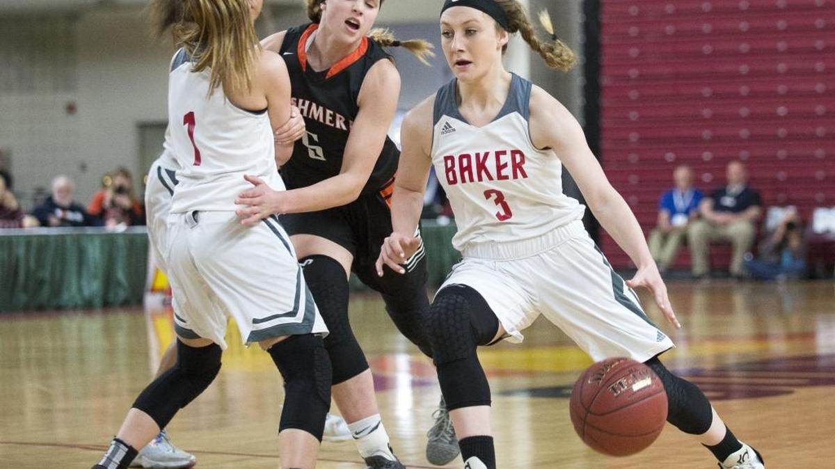 Mount Baker’s Danielle Tyler, right, dribbles toward the hoop as her teammate Haylee Malone sets a screen on Cashmere’s Hailey Van Lith in the 1A state championship game March 4 at the Yakima Valley SunDome. Tyler was one of four Whatcom County players selected to the 2017 Washington/North Idaho All-State Girls Basketball games.