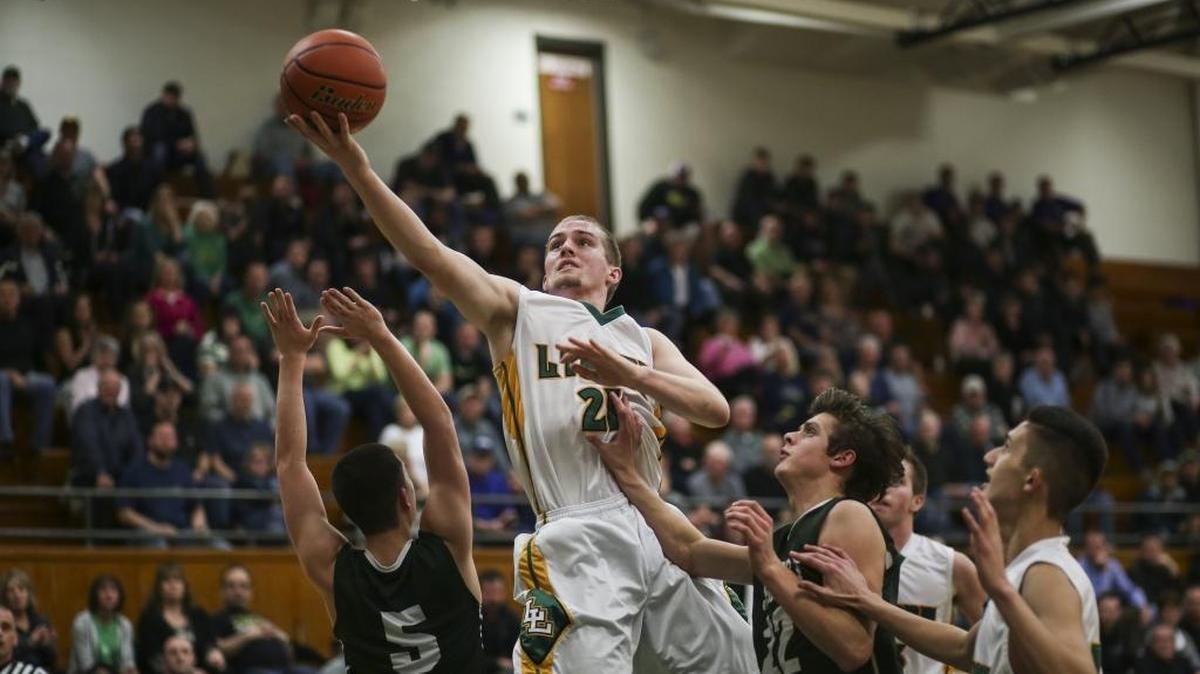 Lynden'’s Andrew Kivlighn makes a layup to tie Shorecrest 40-40 in the third quarter of a 2A district tournament game on Feb. 16. Kivlighn has been selected to play in the 14th Annual Basketball Showcase later this month in Bellevue.