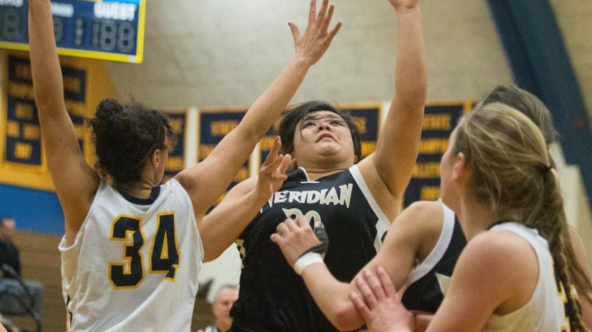 Meridian’s Kiana Gray shoots the ball during a 77-47 loss to Burlington-Edison on Thursday in Burlington.