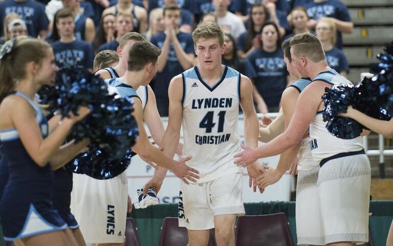 Lynden Christian runs past Newport at 1A Hardwood Classic