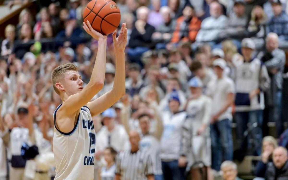 Lynden Christian guard Cole Bajema (13) takes a free throw against Anacortes during the second quarter on Friday evening Jan. 12, 2018, at Lynden Christian High School in Lynden, Wash.