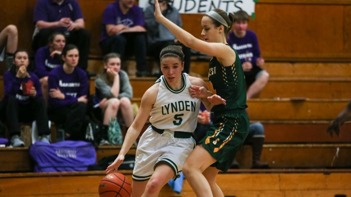 Lynden's Jasmyne Neria drives past Shorecrest'’s Julia Strand during the second quarter of a 52-45 Class 2A District Tournament win Monday, Feb. 15, at Mount Vernon High School. Neria contributed nine points to Lynden’s win.