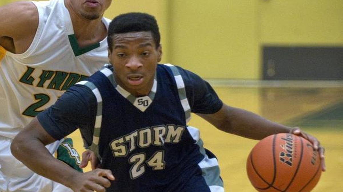 Squalicum’s Damek Mitchell drives to the hoop against Lynden during the 2013-14 season. Mitchell and the Storm were ranked No. 2 in the Class 2A preseason poll released by the Washington Interscholastic Basketball Coaches Association.