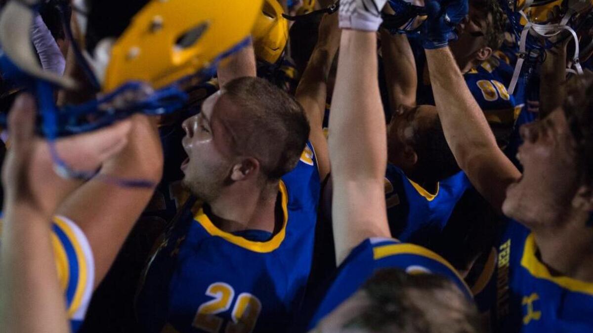 The Ferndale football team celebrates its Week 2 win over rival Lynden Sept. 8 in Ferndale.