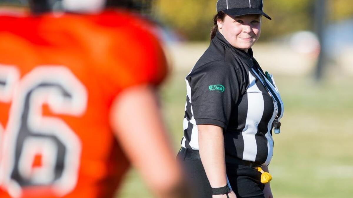 Izzy Cardinale looks toward the sideline chain crew while officiating a game between Blaine Middle School and Meridian Middle School Sept. 28 in Laurel.
