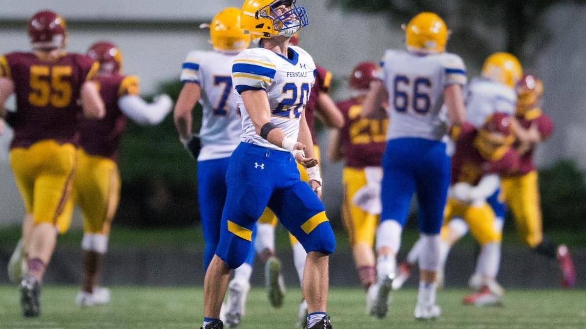 Ferndale's Ben Broselle shows his frustration while walking off the field after O'Dea returns a fumble for a touchdown on Friday in Seattle.