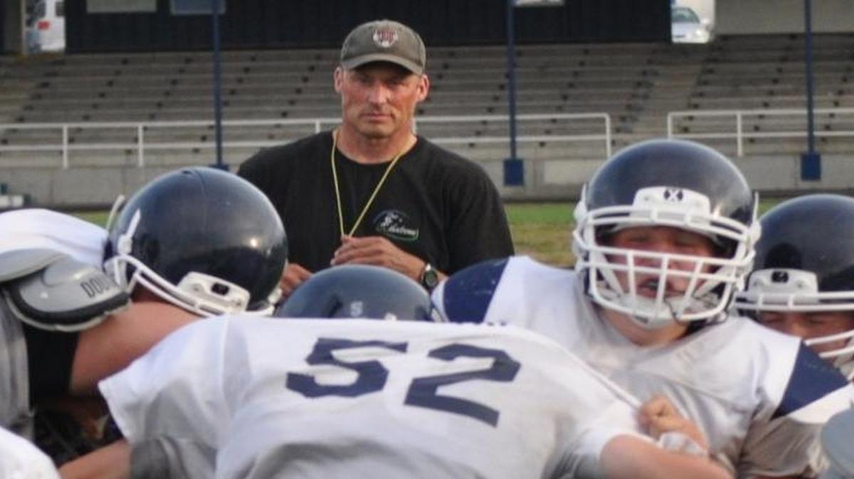 Lynden Christian defensive coach Dan Kaemingk, center, watches the Lyncs run a drill during practice on in 2013. Kaemingk will return as the head coach of the Lyncs after leading the program for 21 years from 1990 to 2010.