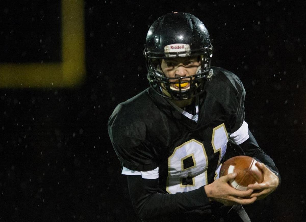Meridian’s TJ Dykstra runs with the ball after making a catch during a 34-14 state semifinal victory over La Center Nov. 25 at Civic Stadium in Bellingham.