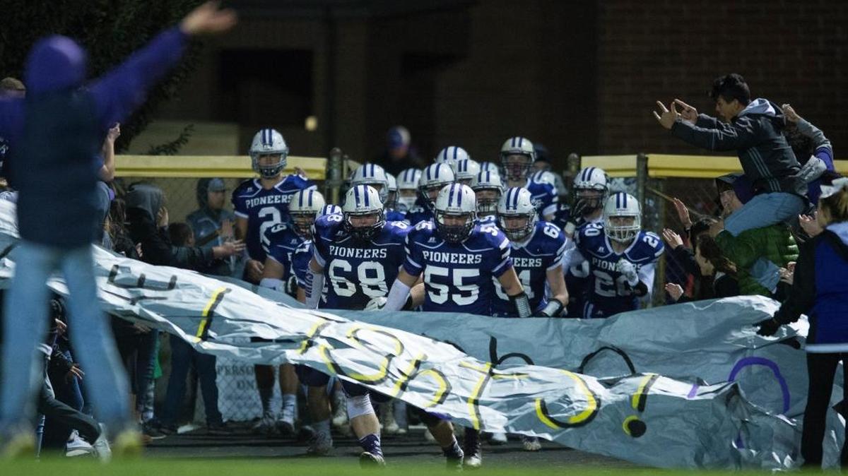 Nooksack Valley takes the field before its game against Meridian Oct. 20. The Pioneers are one of four Whatcom County football teams seeking to earn a playoff spot in Week 9.