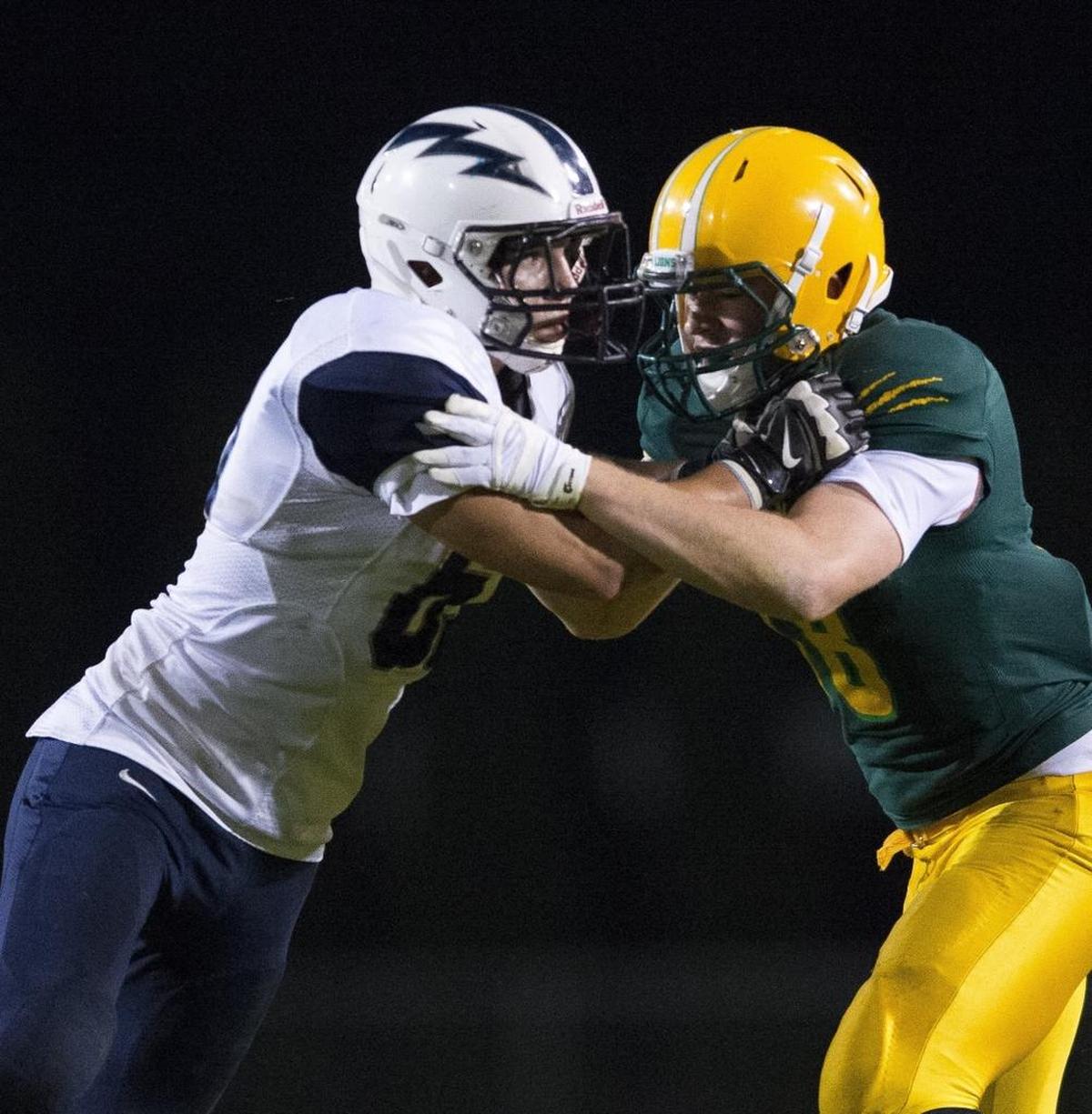 Squalicum’s Jacob Burgoon looks to shed a block during a game against Lynden on Sept. 18.