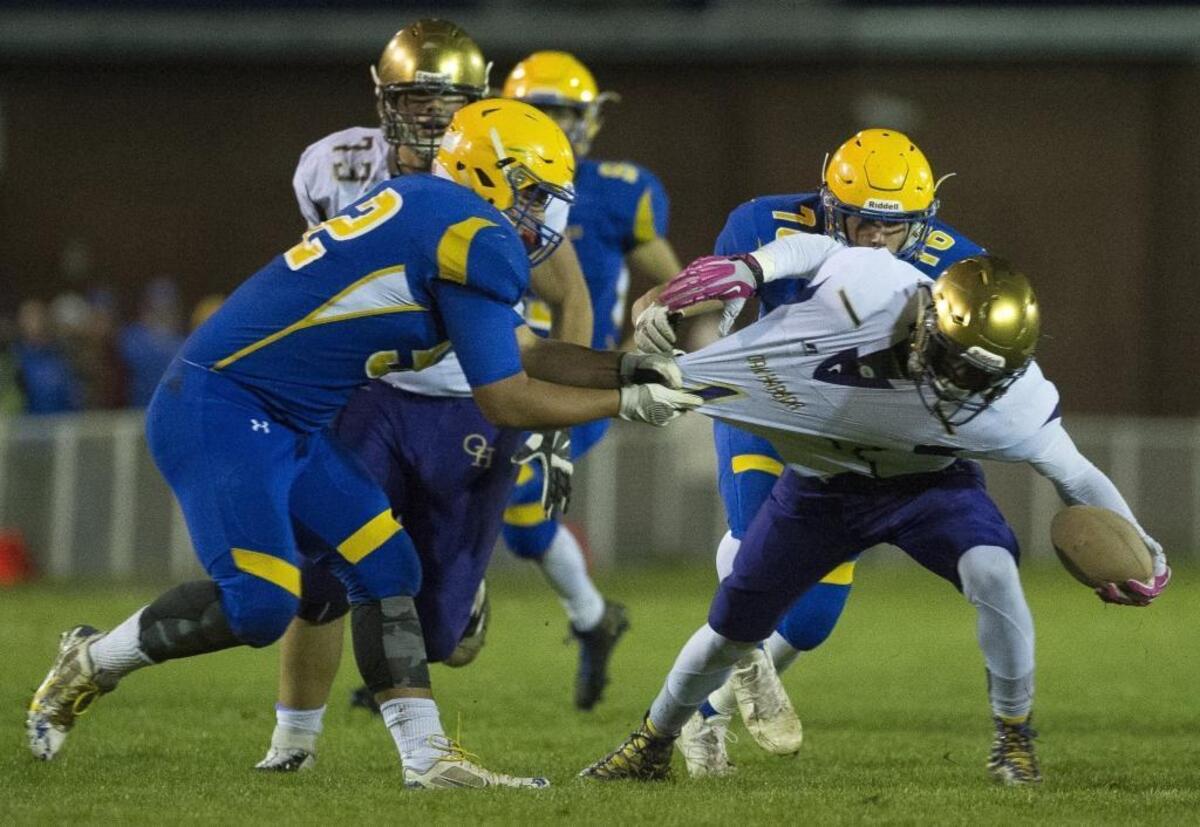 Ferndale’s Winterhawk Leighton drags Oak Harbor’s Taeson Hardin down for a loss Oct. 14. Leighton has been selected to play in the 2017 Native All-Star Football Classic July 1 in Texas.
