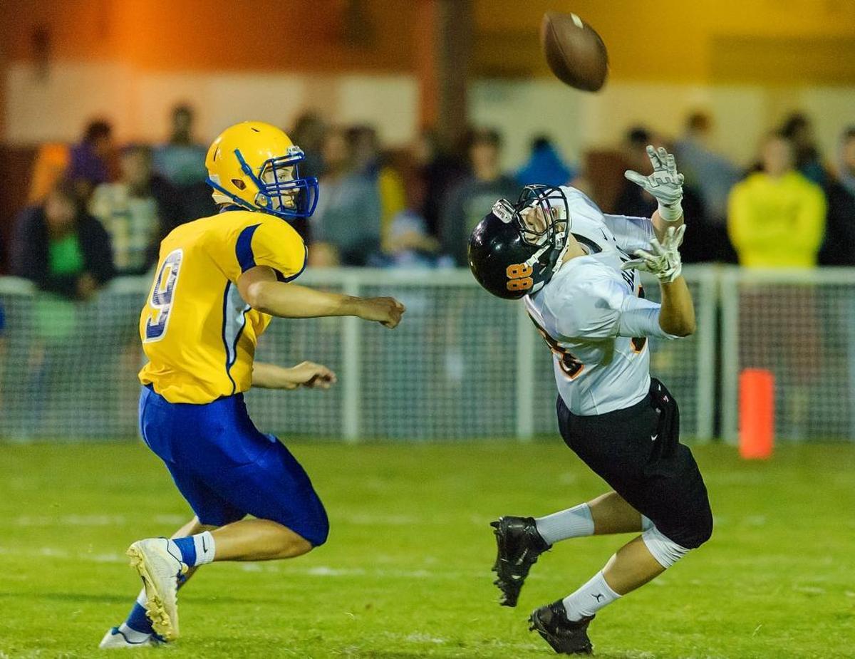 Ferndale defensive back Justice Powell (9) watches Blaine wide receiver Anthony Ball (88) attempt an over the shoulder catch during the second quarter on Friday, Sept. 18, at Ferndale High School in Ferndale.