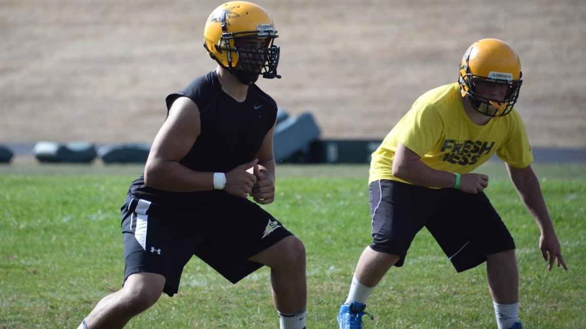 
Sehome’s Jeremy Johnson, left, works on technique during football practice Thursday, Aug. 20 at Sehome High School.
