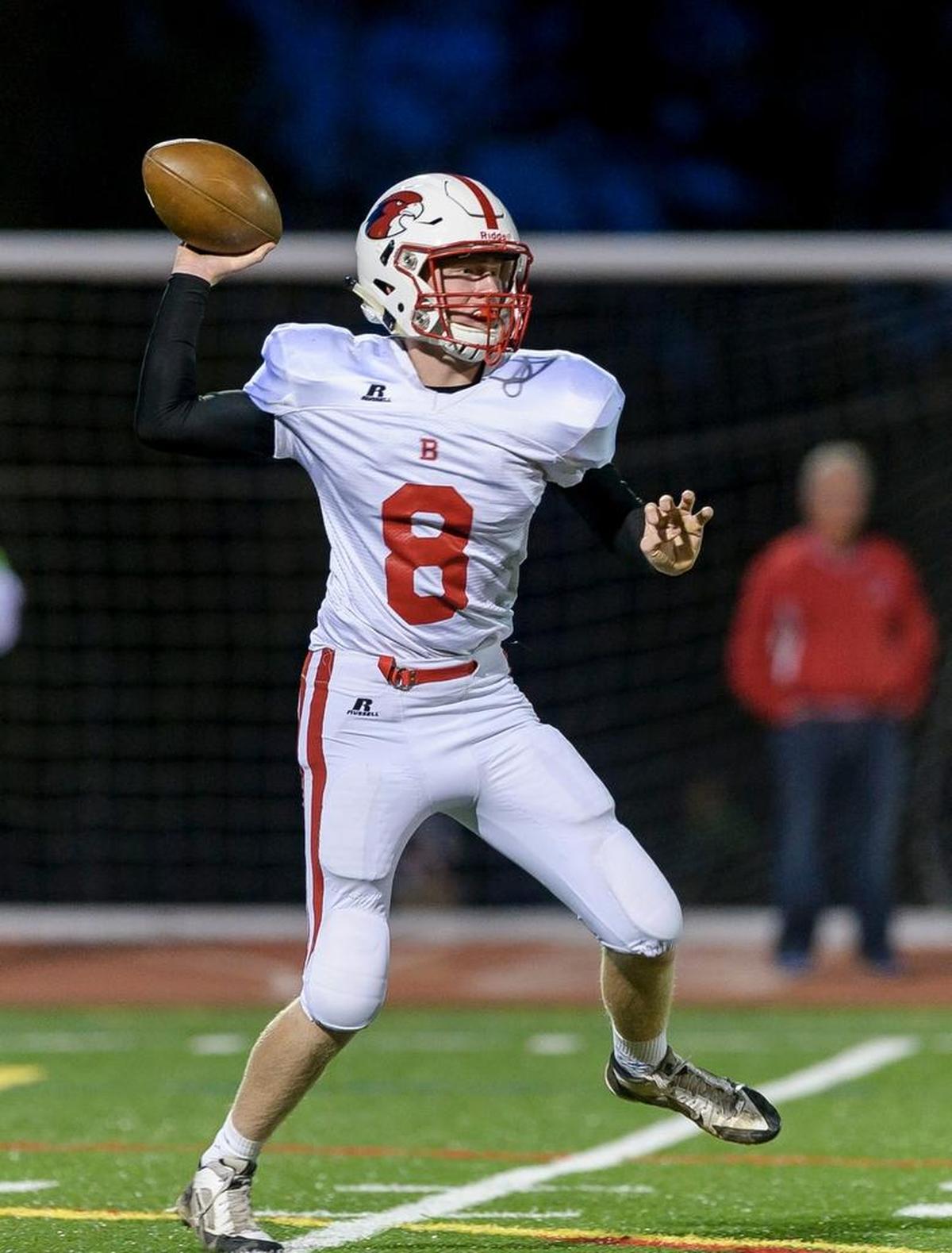 Bellingham quarterback Nick Knutson throws to an open receiver against Squalicum on Sept. 4 at Civic Stadium.